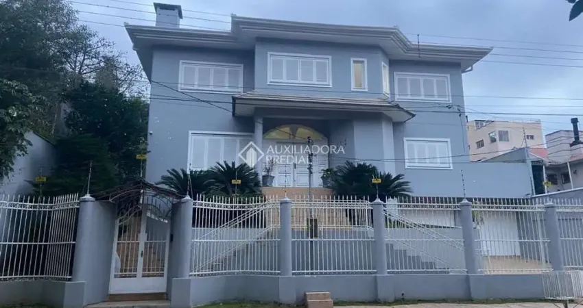 Casa com 5 quartos à venda na Rua Theonila Carvalho da Motta, 184, Parque Santa Fé, Porto Alegre