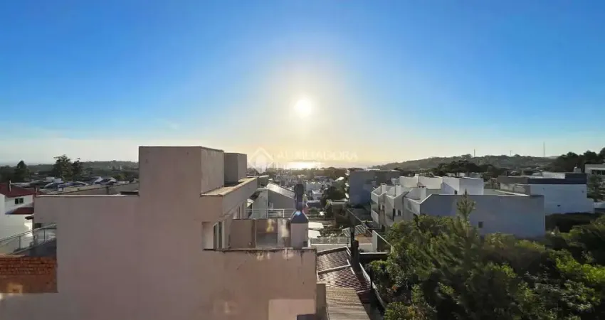 Casa com 3 quartos à venda na Rua Henrique Anawate, 650, Guarujá, Porto Alegre