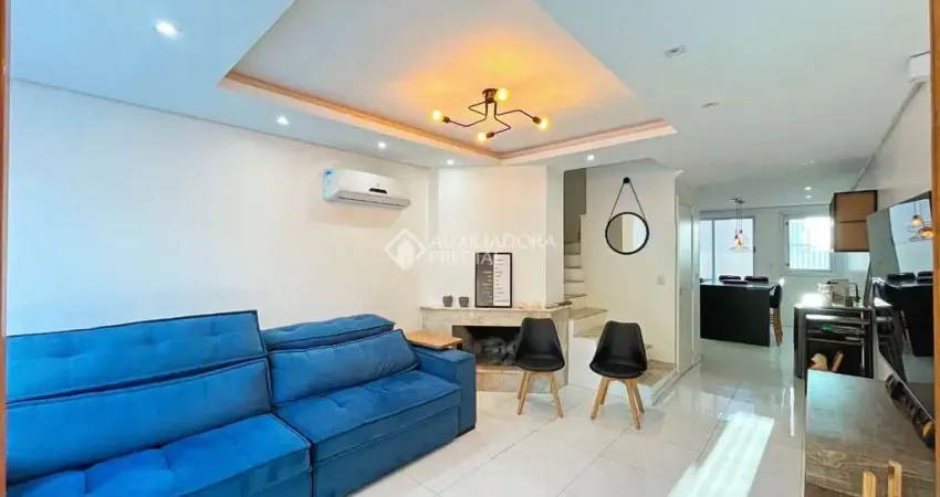 Casa com 3 quartos à venda na Rua Henrique Anawate, 650, Guarujá, Porto Alegre