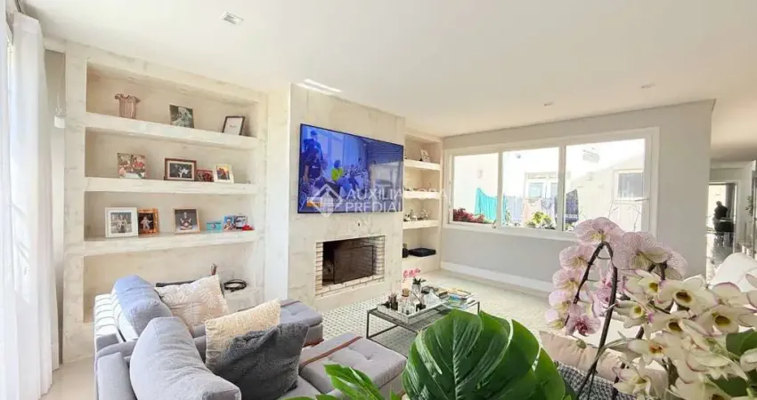 Casa em condomínio fechado com 4 quartos à venda na Rua General Salvador Pinheiro, 215, Vila Jardim, Porto Alegre