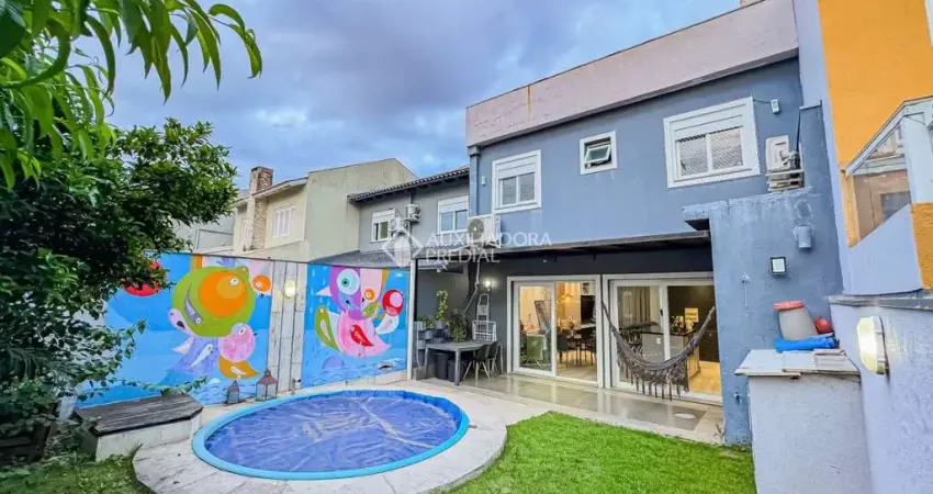 Casa em condomínio fechado com 3 quartos à venda na Rua Deputado Hugo Mardini, 1700, Passo das Pedras, Porto Alegre