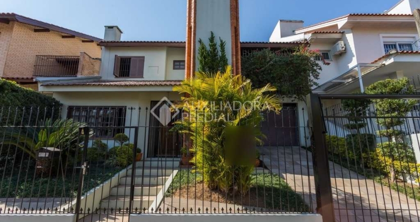 Casa em condomínio fechado com 4 quartos à venda na Rua Walir Zottis, 550, Jardim Itu Sabará, Porto Alegre