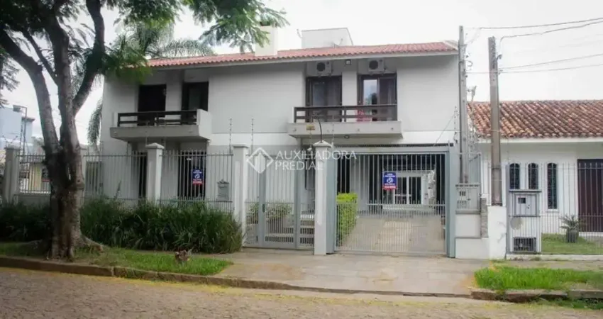 Casa com 5 quartos à venda na Rua Professor Guerreiro Lima, 733, Partenon, Porto Alegre