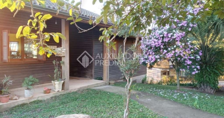 Casa em condomínio fechado com 3 quartos à venda na Rua Maurílio Ferreira, 370, Campo Novo, Porto Alegre