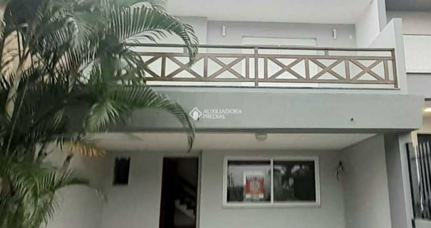 Casa em condomínio fechado com 3 quartos à venda na Rua Angico, 49, Hípica, Porto Alegre