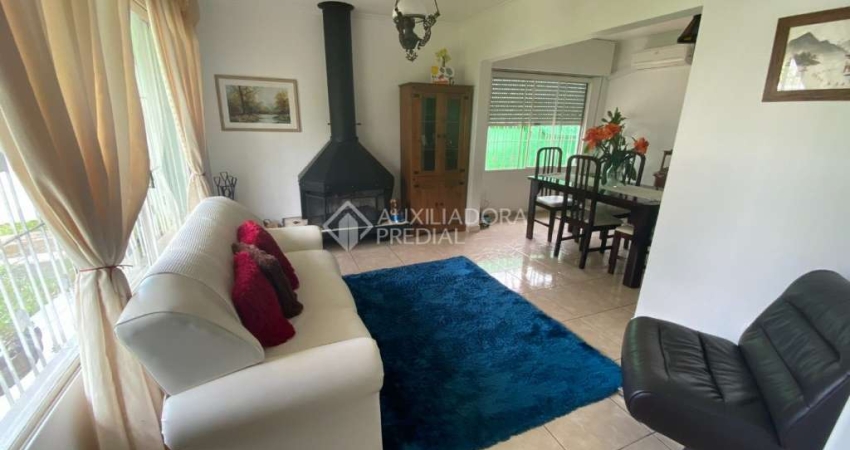 Casa com 4 quartos à venda na Rua Morano Calabro, 408, Jardim Isabel, Porto Alegre