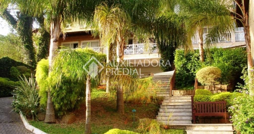 Casa em condomínio fechado com 3 quartos à venda na Rua Professor Xavier Simões, 495, Tristeza, Porto Alegre