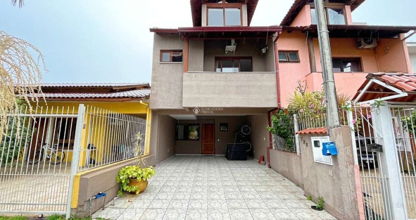Casa em condomínio fechado com 3 quartos à venda na Rua Pau Brasil, 728, Hípica, Porto Alegre