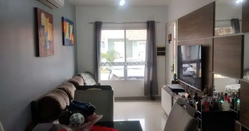 Casa em condomínio fechado com 2 quartos à venda na Rua Embira, 170, Hípica, Porto Alegre