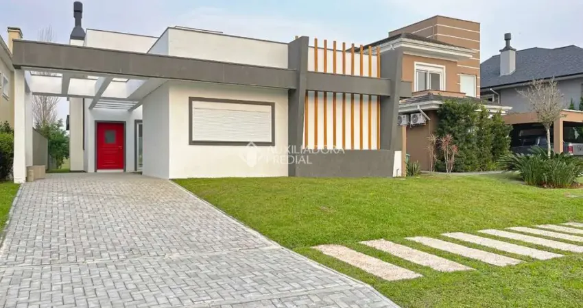 Casa em condomínio fechado com 3 quartos à venda na Avenida Juca Batista, 9000, Belém Novo, Porto Alegre