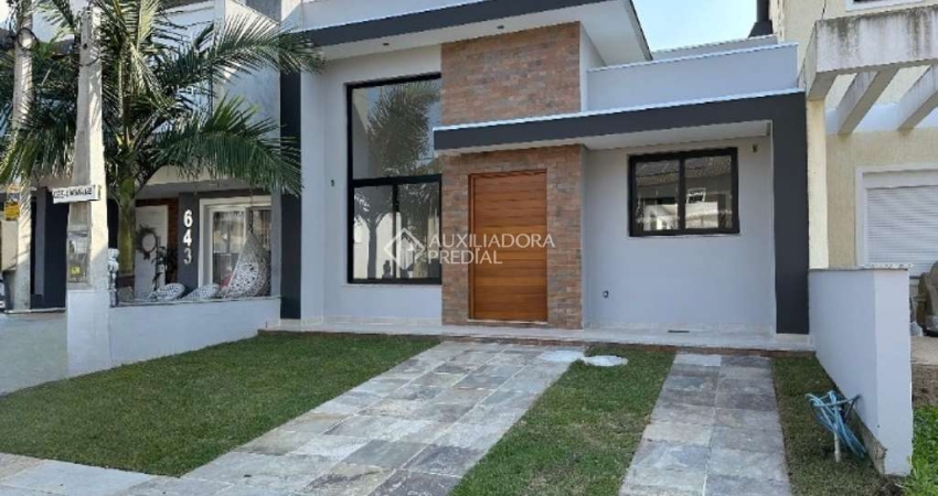 Casa em condomínio fechado com 3 quartos à venda na Rua Pau Brasil, 635, Hípica, Porto Alegre