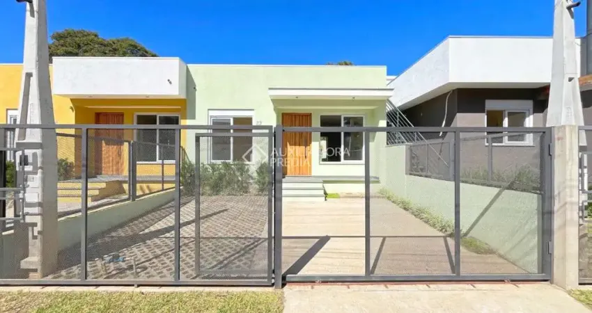 Casa com 3 quartos à venda na Rua Criciúma, 23, Guarujá, Porto Alegre