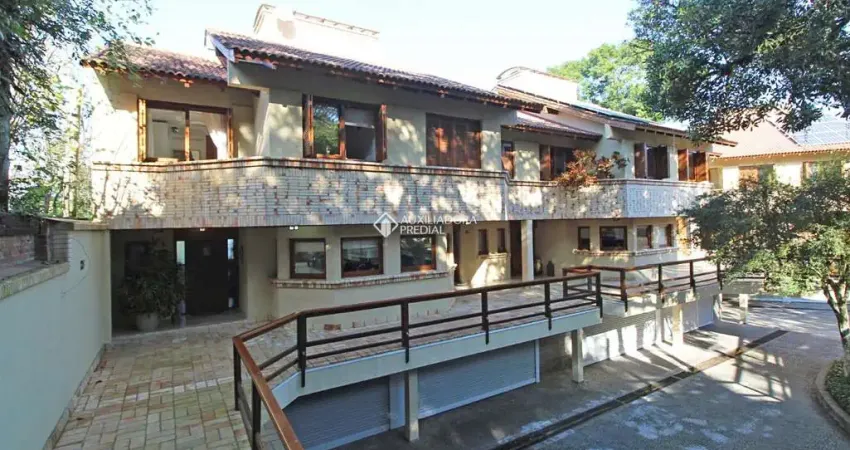 Casa em condomínio fechado com 3 quartos à venda na Rua Apolinário Porto Alegre, 396, Vila Conceição, Porto Alegre