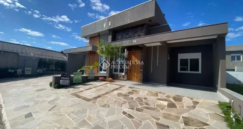 Casa em condomínio fechado com 3 quartos à venda na Avenida Juca Batista, 5505, Hípica, Porto Alegre