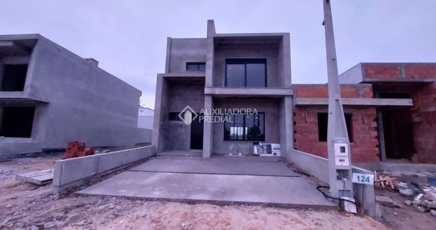 Casa em condomínio fechado com 3 quartos à venda na Avenida Juca Batista, 5505, Hípica, Porto Alegre