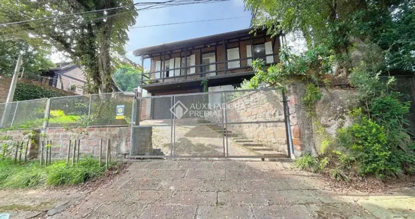 Casa em condomínio fechado com 3 quartos à venda na Rua Charruas, 59, Espírito Santo, Porto Alegre