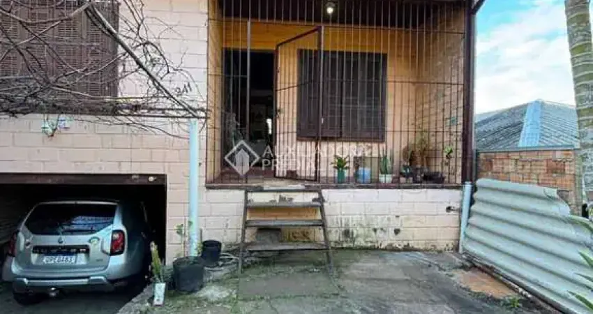 Casa com 2 quartos à venda na Rua Martim Minaberry, 241, Partenon, Porto Alegre
