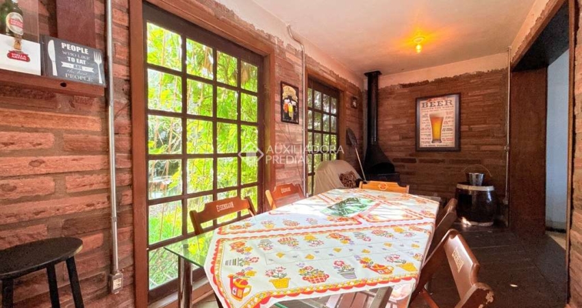 Casa com 4 quartos à venda na Rua Jóia, 220, Vila Nova, Porto Alegre