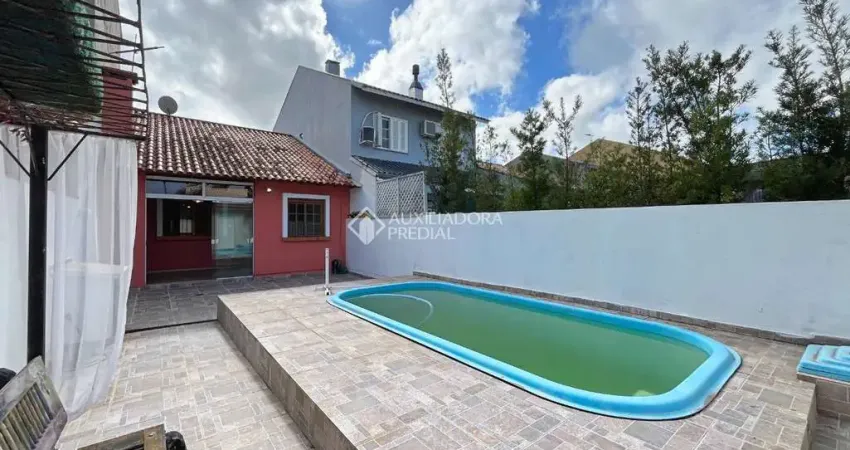 Casa com 2 quartos à venda na Rua Edgar Sanches Laurent, 76, Hípica, Porto Alegre