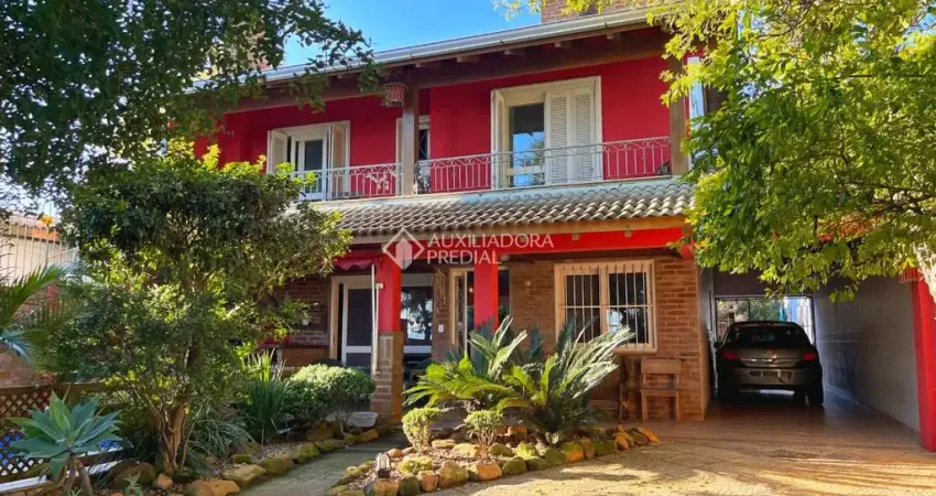 Casa com 4 quartos à venda na Avenida Guaíba, 10660, Ipanema, Porto Alegre