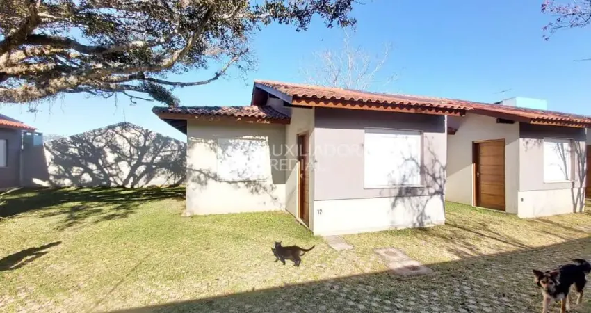 Casa em condomínio fechado com 2 quartos à venda na Rua Santa Mônica, 404, Ponta Grossa, Porto Alegre