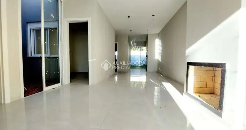 Casa com 3 quartos à venda na Rua Eva Pinto, 113, Hípica, Porto Alegre