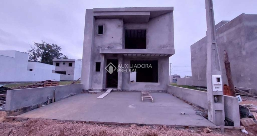 Casa em condomínio fechado com 3 quartos à venda na Avenida Juca Batista, 5505, Hípica, Porto Alegre