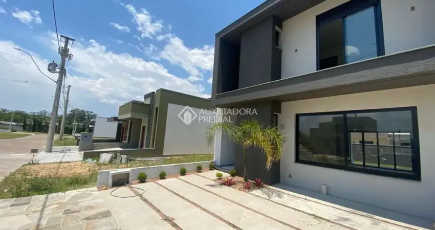 Casa em condomínio fechado com 3 quartos à venda na Avenida Juca Batista, 5505, Hípica, Porto Alegre