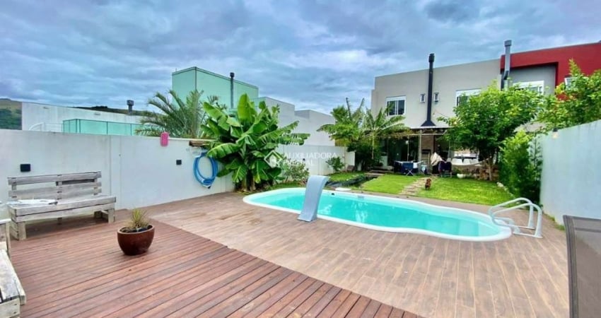 Casa em condomínio fechado com 3 quartos à venda na Avenida Juca Batista, 2705, Hípica, Porto Alegre