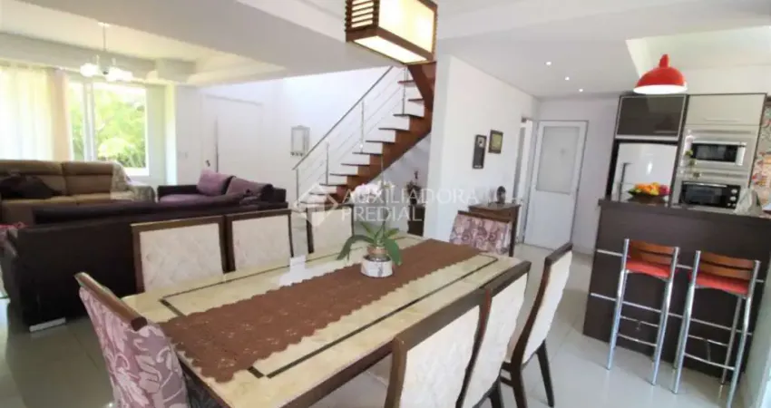 Casa em condomínio fechado com 5 quartos à venda na Rua Ivo Walter Kern, 599, Hípica, Porto Alegre