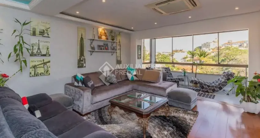 Casa em condomínio fechado com 4 quartos à venda na Rua Luiz Voelcker, 351, Três Figueiras, Porto Alegre