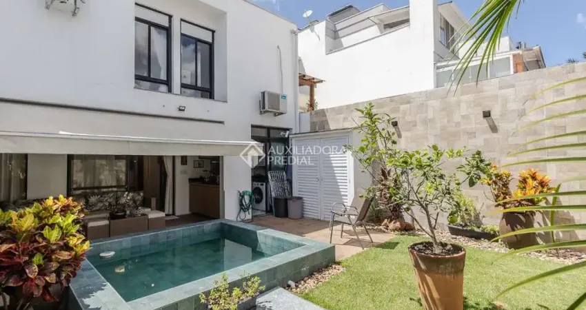 Casa em condomínio fechado com 3 quartos à venda na Rua Adriano Pereira da Silva, 290, Vila Nova, Porto Alegre