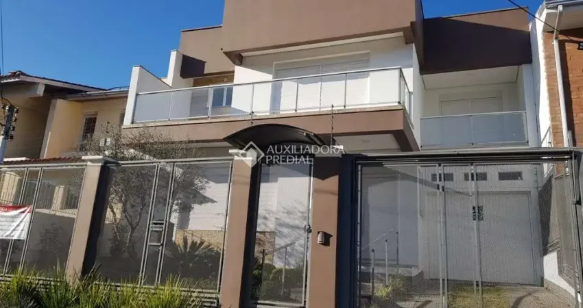 Casa em condomínio fechado com 4 quartos à venda na Rua Doutor Jorge Fayet, 693, Chácara das Pedras, Porto Alegre