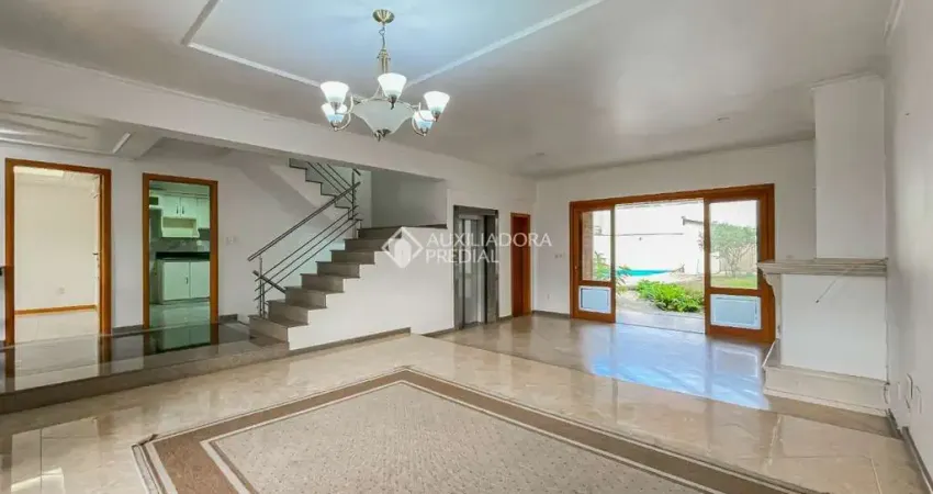 Casa em condomínio fechado com 3 quartos à venda na Rua Licínio Cardoso, 305, Chácara das Pedras, Porto Alegre