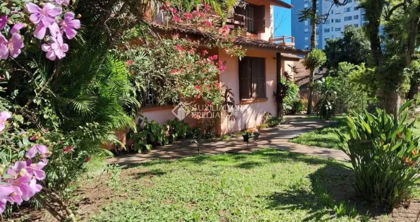 Casa com 4 quartos à venda na Rua Itapitocaí, 725, Cristal, Porto Alegre