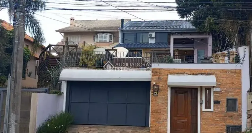 Casa em condomínio fechado com 3 quartos à venda na Rua Charruas, 257, Espírito Santo, Porto Alegre