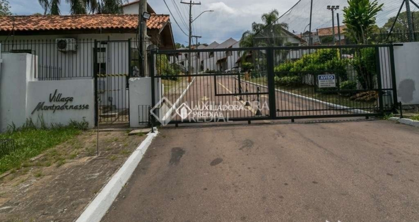 Casa em condomínio fechado com 3 quartos à venda na Avenida Eduardo Prado, 695, Cavalhada, Porto Alegre