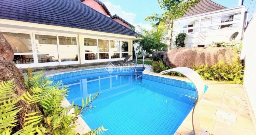 Casa em condomínio fechado com 3 quartos à venda na Rua Doutor Arnaldo da Silva Ferreira, 465, Jardim Isabel, Porto Alegre