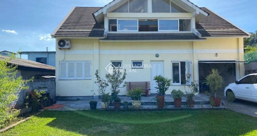 Casa com 4 quartos à venda na Rua Zeno Schmiedel, 636, Floresta, Estância Velha