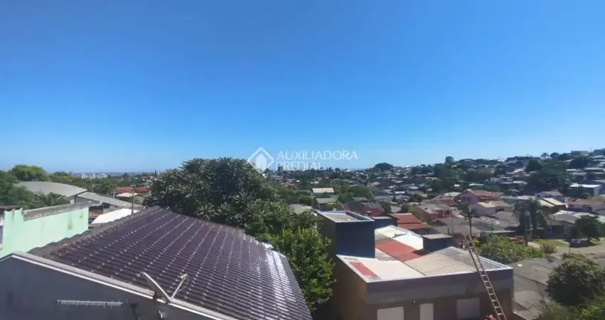 Casa com 3 quartos à venda na Avenida Tharcilo Nunes, 695, Santo André, São Leopoldo