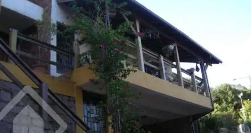 Casa com 4 quartos à venda na Acesso Hélio Alves da Rocha, 85, Vila Nova, Porto Alegre