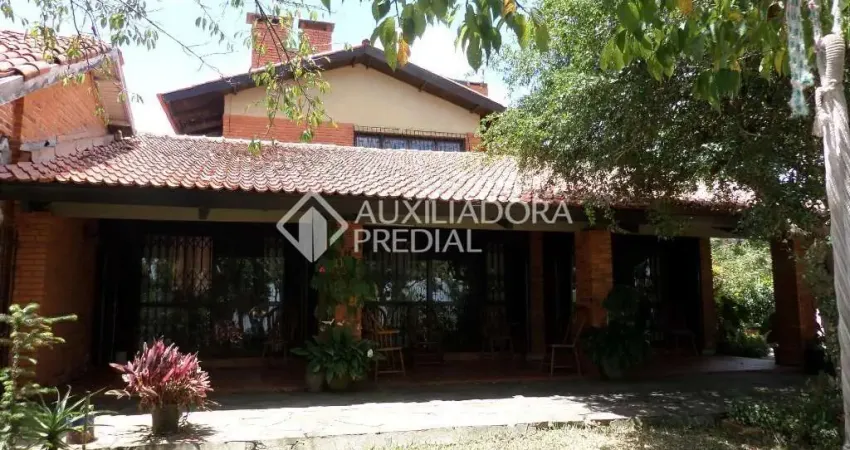 Casa em condomínio fechado com 4 quartos à venda na Avenida Guaíba, 900, Ipanema, Porto Alegre