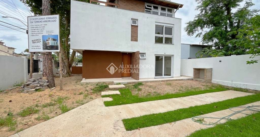 Casa com 3 quartos à venda na Rua dos Guenoas, 1200, Guarujá, Porto Alegre