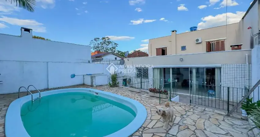 Casa com 4 quartos à venda na Rua Dom Pedrito, 317, Passo da Areia, Porto Alegre