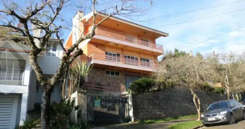 Casa com 4 quartos à venda na Rua Caeté, 1047, Vila Assunção, Porto Alegre