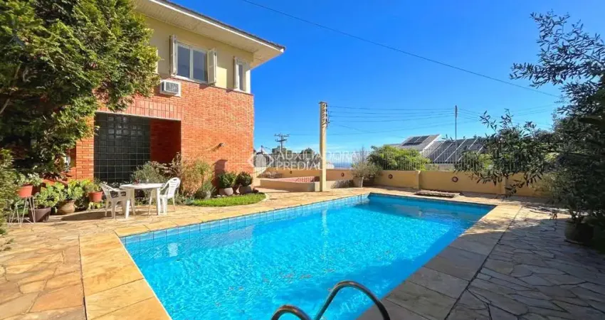 Casa com 5 quartos à venda na Rua Dona Lida Monteiro, 80, Teresópolis, Porto Alegre