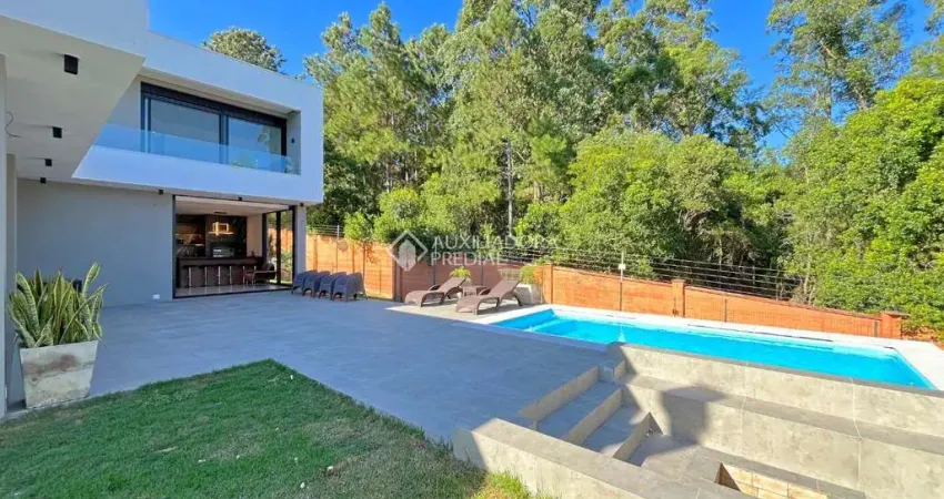 Casa em condomínio fechado com 4 quartos à venda na Estrada das Três Meninas, 2000, Vila Nova, Porto Alegre