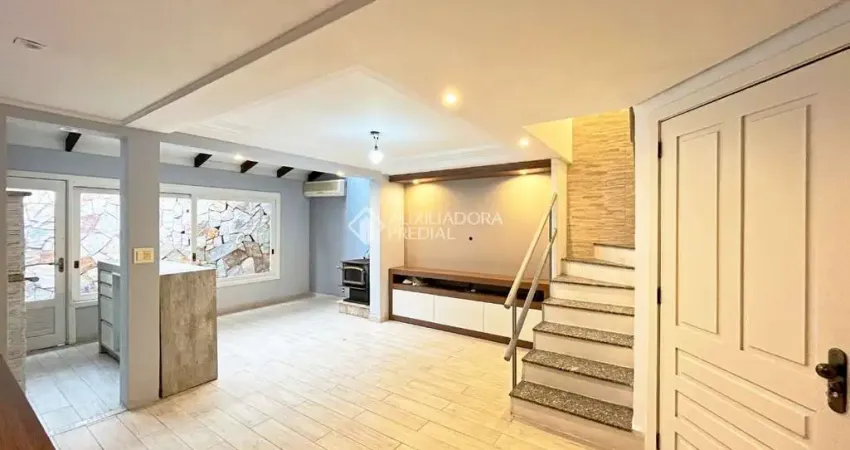 Casa em condomínio fechado com 3 quartos à venda na Avenida Wenceslau Escobar, 3714, Vila Conceição, Porto Alegre