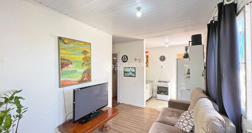 Casa com 2 quartos à venda na Rua Padre João Batista Reus, 3220, Camaquã, Porto Alegre