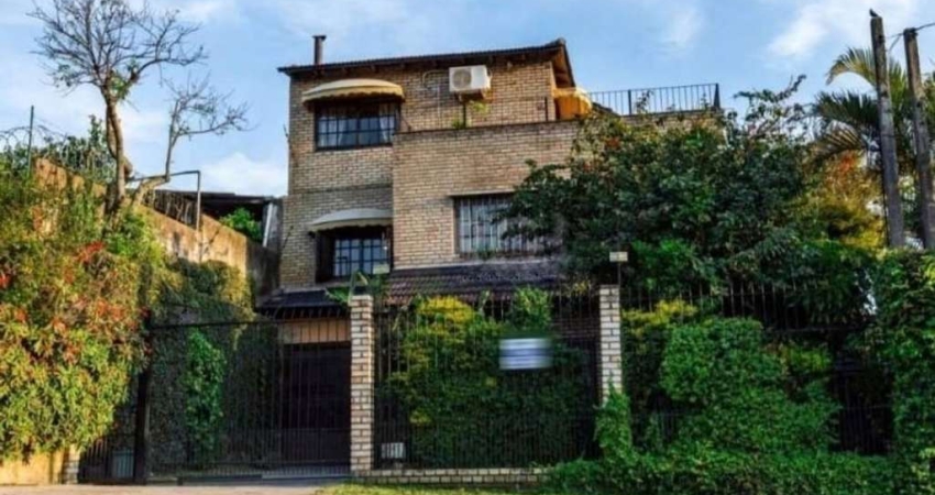 Casa com 3 quartos à venda na Rua Arapei, 325, Cristal, Porto Alegre